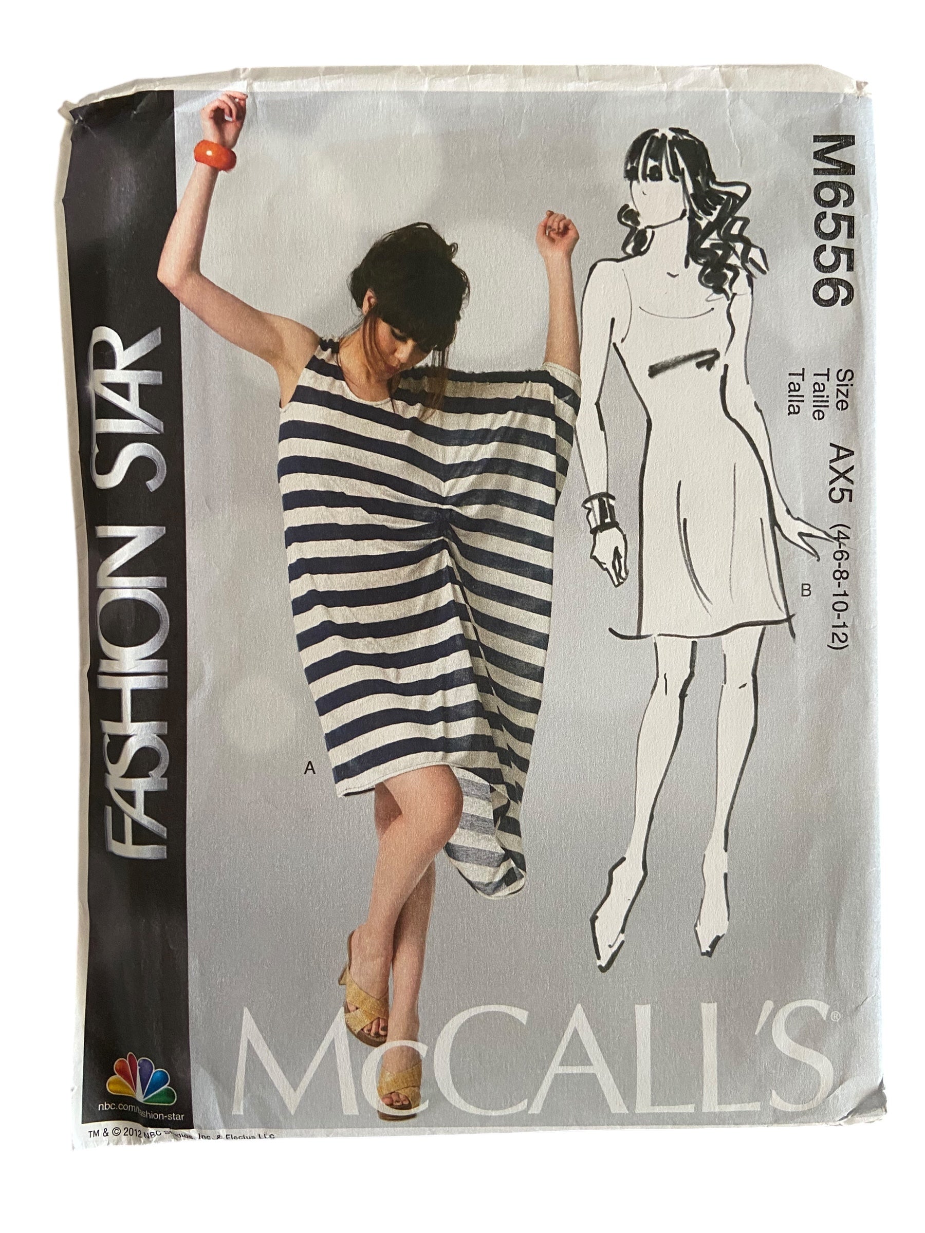 McCall's M6556 Fashion Star dress sewing pattern from the 2000s. Bust 29.5, 30.5, 31.5, 32.5, 34 inches.