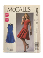 McCall's M6834 dress sewing pattern from the 2000s. Bust 36, 38, 40, 42, 44 inches.