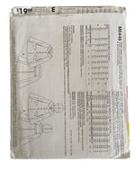 McCall’s M6446 cape sewing pattern from the 2000s. Bust 30.5, 31.5, 32.5, 34 inches.