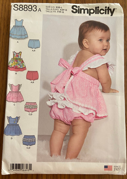 Simplicity S8893 babies pinafores and panties with fabric and trim variations sewing pattern. Multisize pattern.