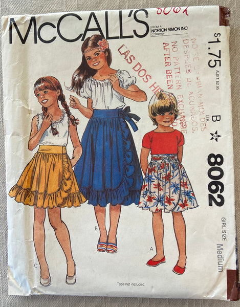 McCall's 8062 vintage 1970s girl's wrap skirt sewing pattern. Waist 23.5 and 24.5 inches